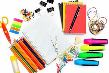 School Supplies Arranged On A White Background For Homeschooling.