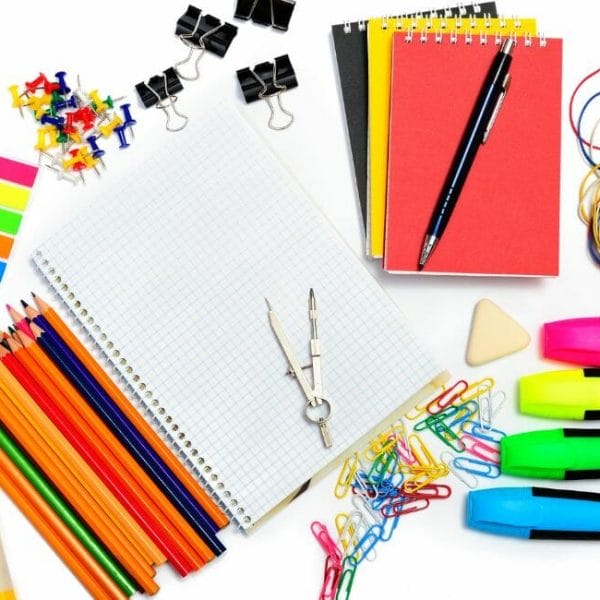School Supplies Arranged On A White Background For Homeschooling.
