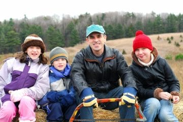 A Family with homeschooling high school children are outdoor